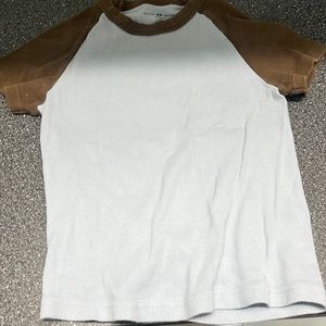 Size is a small. From brandy Melville!